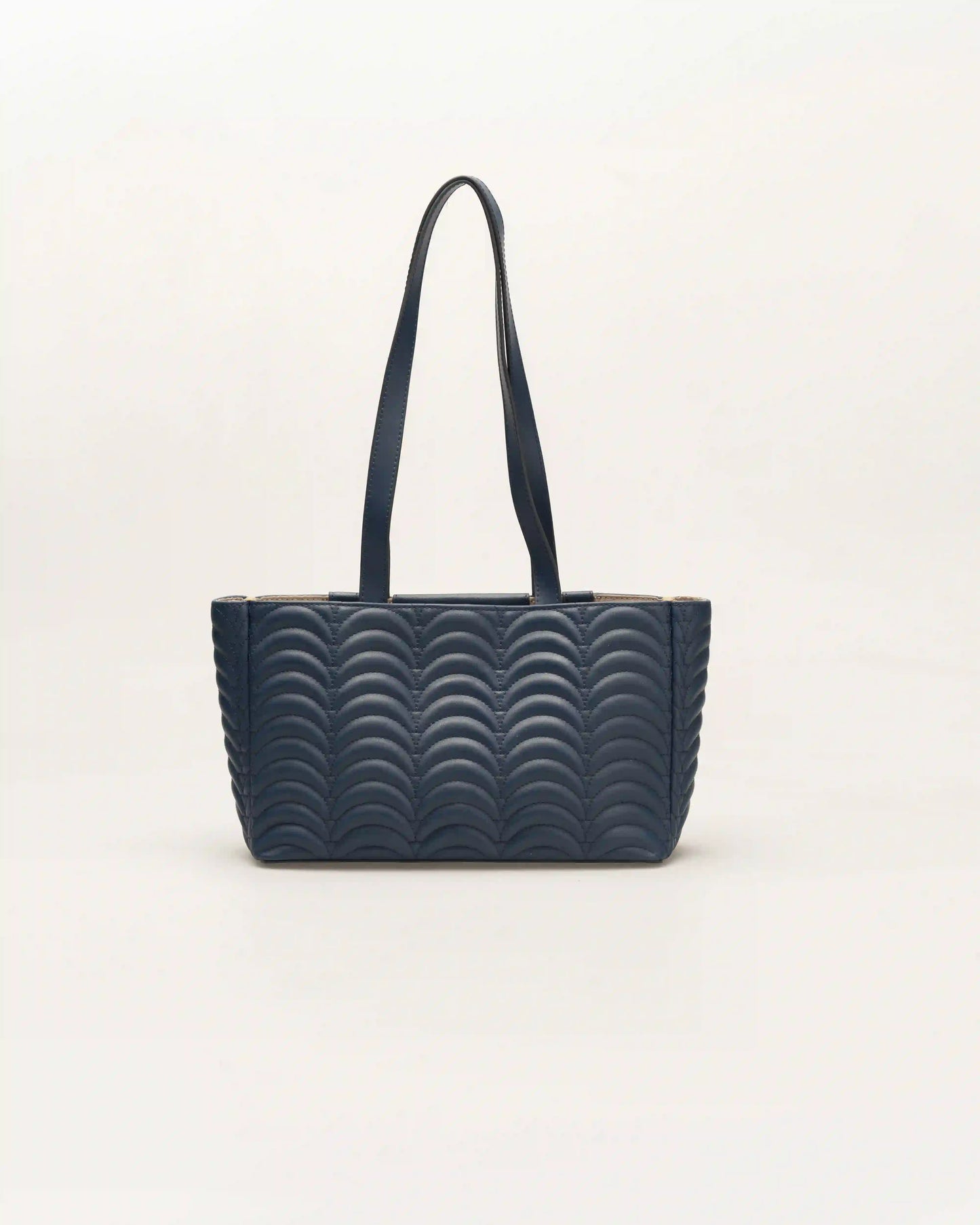 Navy blue ann designer shoulder bag with luxurious texture and classic appeal.